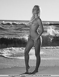 Smoldering blonde enjoying the sunshine coupled with the sea off out of one's mind herself.