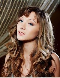 Petite charmer with angelic face, and youthful beauty.