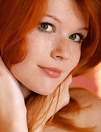 Mia is one sexy redhead you would deficiency to be on top of your bed presently you come from work.